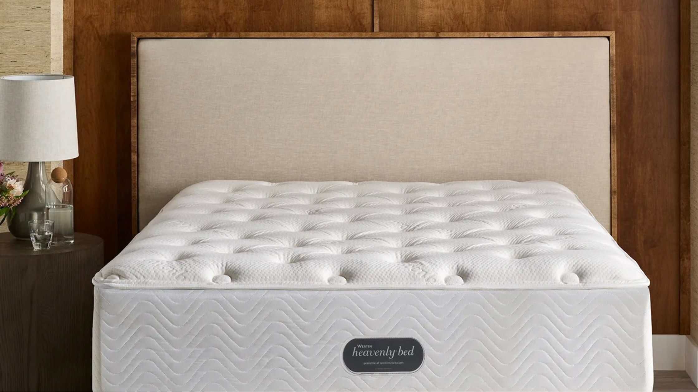Luxury Westin Heavenly Bed in a modern hotel room with premium white bedding and pillows